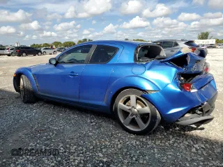 2006 Mazda RX-8 with VIN JM1FE173260203112, listed as a Copart auction lot 85824464 with 112,776 mi miles and Salvage Title. Bid and sale history available at carsss.com. Image 2.