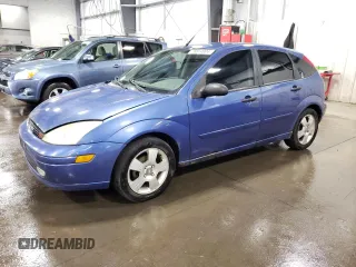2004 Ford Focus ZX5 z VIN 3FAFP37354R102932, wystawiony jako Copart lot #78814004 z przebiegiem 203 087 mil mil oraz Szkoda całkowita • Salvage title. Historia ofert i sprzedaży dostępna na DreamBid. Obrazek 1.