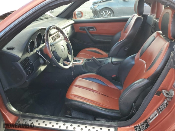 2000 Mercedes-Benz SLK-Class Kompressor with VIN WDBKK47F0YF145180, listed as a Copart auction lot 86648924 with 130,460 mi miles and Salvage Title. Bid and sale history available at carsss.com. Image 7.