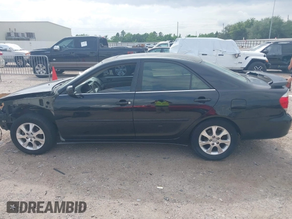 2005 Toyota Camry LE with VIN 4T1BF32K15U091945, listed as a IAAI auction lot 42124503 with 212,951 mi miles and . Bid and sale history available at DreamBid. Image 15.