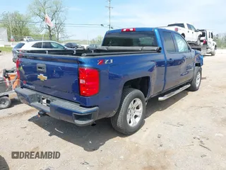 2018 Chevrolet Silverado 1500 LT with VIN 1GCVKREC9JZ123333, listed as a IAAI auction lot 42070916 with 142,814 mi miles and . Bid and sale history available at DreamBid. Image 4.