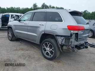 2019 Jeep Grand Cherokee High Altitude with VIN 1C4RJFCG1KC570199, listed as a IAAI auction lot 42464644 with 94,126 mi miles and . Bid and sale history available at DreamBid. Image 3.
