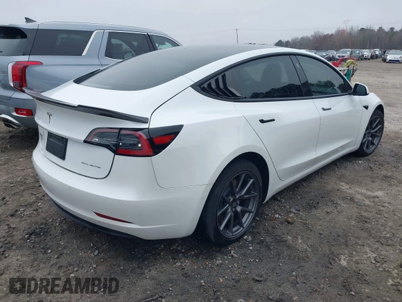 2021 Tesla Model 3 Long Range z VIN 5YJ3E1EB9MF014985, wystawiony jako IAAI lot #41672208 z przebiegiem 52 222 mil mil oraz . Historia ofert i sprzedaży dostępna na DreamBid. Obrazek 4.
