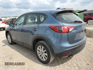 2015 Mazda CX-5 Sport z VIN JM3KE2BE8F0434116, wystawiony jako Copart lot #60712625 z przebiegiem 300 405 mil mil oraz Szkoda całkowita • Salvage title. Historia ofert i sprzedaży dostępna na DreamBid. Obrazek 2.