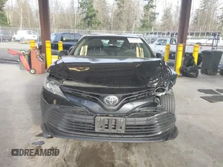 2020 Toyota Camry LE with VIN 4T1C11AKXLU363530, listed as a IAAI auction lot 41670307 with 86,459 mi miles. Bid and sale history available at carsss.com. Image 12.