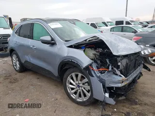2022 Ford Escape Titanium Hybrid z VIN 1FMCU9DZ9NUA92705, wystawiony jako IAAI lot #41475869 z przebiegiem 29 522 mil mil oraz . Historia ofert i sprzedaży dostępna na DreamBid. Obrazek 1.