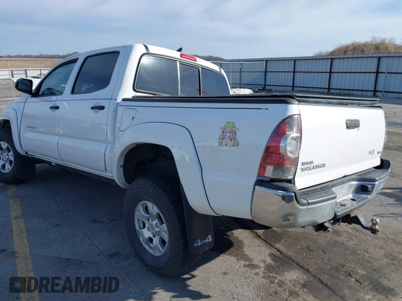 2015 Toyota Tacoma with VIN 3TMLU4EN8FM184297, listed as a IAAI auction lot 41759278 with 116,158 mi miles and . Bid and sale history available at DreamBid. Image 3.