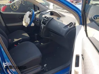 2009 Toyota Yaris with VIN JTDKT903X95257701, listed as a IAAI auction lot 41796420 with 86,953 mi miles. Bid and sale history available at carsss.com. Image 5.