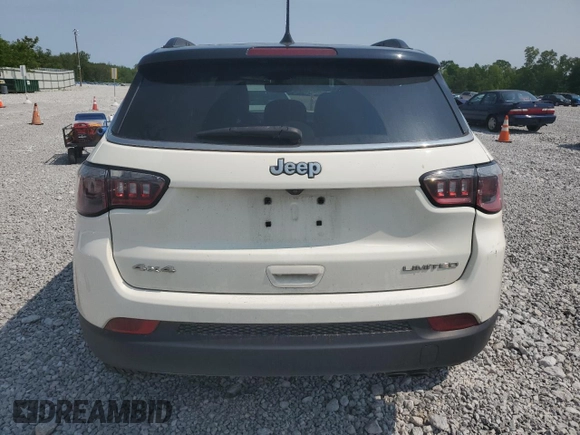 2018 Jeep Compass Limited z VIN 3C4NJDCB6JT206659, wystawiony jako Copart lot #58779315 z przebiegiem Nie podano mil oraz Szkoda całkowita • Salvage title. Historia ofert i sprzedaży dostępna na DreamBid. Obrazek 6.