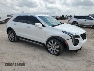 2021 Cadillac XT4 FWD Premium Luxury with VIN 1GYFZCR44MF080763, listed as a Copart auction lot 54059525 with 46,319 mi miles and Salvage Title. Bid and sale history available at carsss.com. Image 4.
