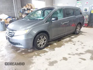 2012 Honda Odyssey EX-L with VIN 5FNRL5H63CB137198, listed as a IAAI auction lot 42706690 with 305,753 mi miles and . Bid and sale history available at DreamBid. Image 17.
