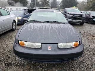 2000 Saturn SL with VIN 1G8ZK5270YZ269898, listed as a Copart auction lot 88082365 with 124,233 mi miles and Salvage title. Bid and sale history available at DreamBid. Image 5.