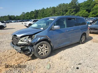 2006 Honda Odyssey EX-L with VIN 5FNRL38776B067738, listed as a Copart auction lot 59579265 with 264,410 mi miles and Salvage title. Bid and sale history available at DreamBid. Image 1.