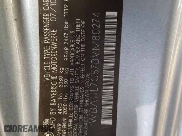 2011 BMW 1 Series 128i with VIN WBAUL7C57BVM80274, listed as a Copart auction lot 52127595 with 104,952 mi miles and Salvage title. Bid and sale history available at DreamBid. Image 12.
