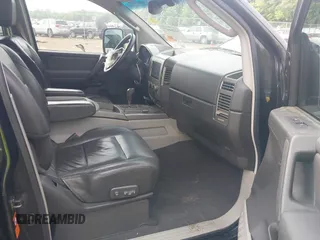 2004 Nissan Titan LE z VIN 1N6AA07A14N592255, wystawiony jako IAAI lot #42264477 z przebiegiem 191 259 mil mil oraz . Historia ofert i sprzedaży dostępna na DreamBid. Obrazek 5.
