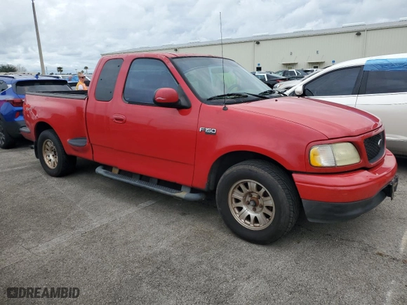 2003 Ford F-150 XL with VIN 1FTRX07243KB72082, listed as a Copart auction lot 74593004 with 0 mi miles and Salvage Title. Bid and sale history available at carsss.com. Image 4.