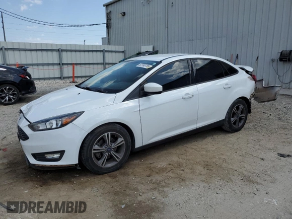 2018 Ford Focus SE with VIN 1FADP3FE5JL220077, listed as a Copart auction lot 52395795 with 87,785 mi miles and Salvage Title. Bid and sale history available at carsss.com. Image 1.
