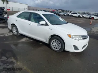 2014 Toyota Camry Hybrid LE with VIN 4T1BD1FKXEU115146, listed as a IAAI auction lot 41703335 with 579,750 mi miles. Bid and sale history available at carsss.com. Image 1.