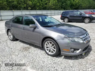 2012 Ford Fusion SEL with VIN 3FAHP0JA4CR292185, listed as a Copart auction lot 60916345 with 212,685 mi miles and Salvage title. Bid and sale history available at DreamBid. Image 4.