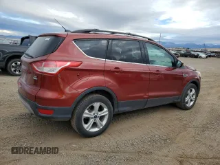 2015 Ford Escape SE with VIN 1FMCU9GX6FUC67715, listed as a Copart auction lot 73495244 with 184,183 mi miles and Salvage Title. Bid and sale history available at DreamBid. Image 3.
