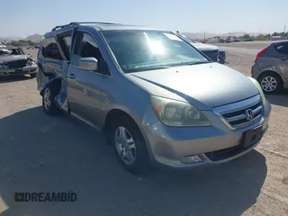 2005 Honda Odyssey Touring z VIN 5FNRL38895B083236, wystawiony jako IAAI lot #42043046 z przebiegiem 205 141 mil mil oraz . Historia ofert i sprzedaży dostępna na DreamBid. Obrazek 1.