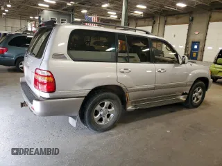 2002 Toyota Land Cruiser z VIN JTEHT05J922018964, wystawiony jako Copart lot #60111015 z przebiegiem 245 890 mil mil oraz Czysty tytuł • Clean title. Historia ofert i sprzedaży dostępna na DreamBid. Obrazek 3.