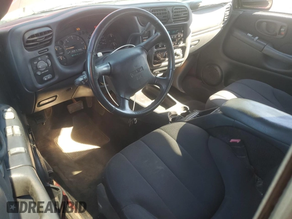 2003 GMC Sonoma SLS z VIN 1GTCS19X538152441, wystawiony jako Copart lot #75249904 z przebiegiem 100 250 mil mil oraz Szkoda całkowita • Salvage title. Historia ofert i sprzedaży dostępna na DreamBid. Obrazek 8.