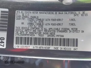 2023 Toyota Tacoma SR with VIN 3TMCZ5AN9PM574534, listed as a IAAI auction lot 41167910 with 27,375 mi miles and . Bid and sale history available at DreamBid. Image 9.