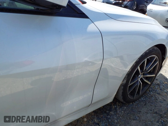 2022 BMW 4 Series 430i xDrive with VIN WBA73AP09NCJ28175, listed as a IAAI auction lot 41486064 with 27,312 mi miles and . Bid and sale history available at DreamBid. Image 20.
