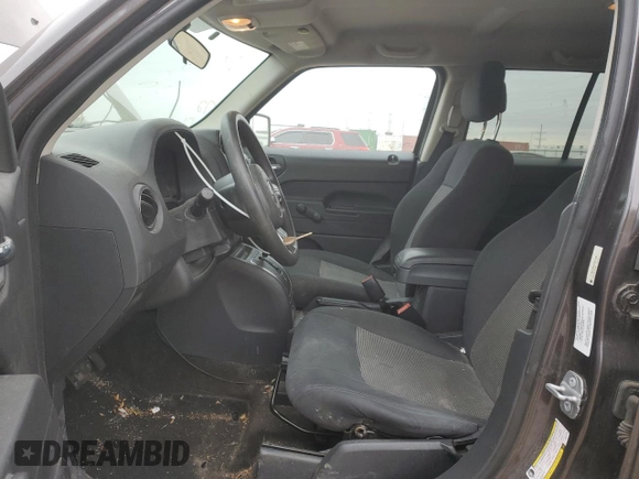 2014 Jeep Patriot Altitude with VIN 1C4NJPBA4ED911496, listed as a Copart auction lot 52390435 with 125,114 mi miles and Salvage Title. Bid and sale history available at DreamBid. Image 7.