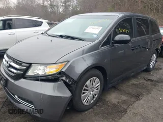 2014 Honda Odyssey LX z VIN 5FNRL5H2XEB009962, wystawiony jako IAAI lot #41902277 z przebiegiem 152 661 mil mil oraz . Historia ofert i sprzedaży dostępna na DreamBid. Obrazek 2.