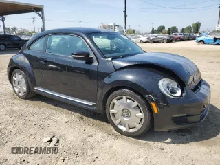2012 Volkswagen Beetle 2.5L w/Sound/Nav PZEV with VIN 3VWJP7AT7CM646779, listed as a Copart auction lot 53756265 with 116,662 mi miles and Salvage Title. Bid and sale history available at DreamBid. Image 4.