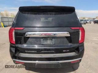 2023 GMC Yukon XL SLT z VIN 1GKS2GKD3PR282110, wystawiony jako Copart lot #52950425 z przebiegiem 99 147 mil mil oraz Szkoda całkowita • Salvage title. Historia ofert i sprzedaży dostępna na DreamBid. Obrazek 6.
