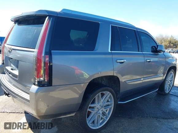 2018 Cadillac Escalade Luxury z VIN 1GYS3BKJ0JR147752, wystawiony jako IAAI lot #41419140 z przebiegiem 124 376 mil mil oraz . Historia ofert i sprzedaży dostępna na DreamBid. Obrazek 4.