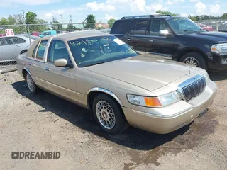 2000 Mercury Grand Marquis GS z VIN 2MEFM74W3YX610461, wystawiony jako IAAI lot #42162767 z przebiegiem 181 400 mil mil oraz . Historia ofert i sprzedaży dostępna na DreamBid. Obrazek 1.
