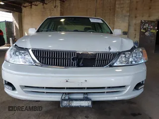 2001 Toyota Avalon XL z VIN 4T1BF28B01U144968, wystawiony jako IAAI lot #41923697 z przebiegiem 184 442 mil mil oraz . Historia ofert i sprzedaży dostępna na DreamBid. Obrazek 6.