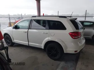 2019 Dodge Journey SE z VIN 3C4PDCBB6KT837425, wystawiony jako IAAI lot #42481512 z przebiegiem 83 382 mil mil oraz . Historia ofert i sprzedaży dostępna na DreamBid. Obrazek 14.