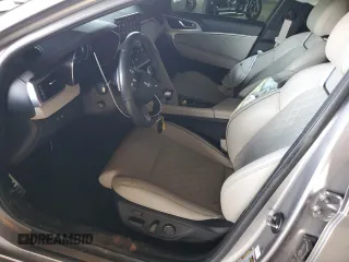2022 Genesis G70 3.3T z VIN KMTG54TE8NU090398, wystawiony jako Copart lot #55102905 z przebiegiem 30 960 mil mil oraz Szkody całkowita. Historia ofert i sprzedaży dostępna na DreamBid. Obrazek 7.