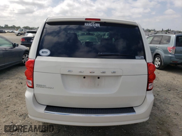 2013 Dodge Grand Caravan SE with VIN 2C4RDGBG3DR560962, listed as a Copart auction lot 53690225 with 124,796 mi miles and Salvage Title. Bid and sale history available at DreamBid. Image 6.