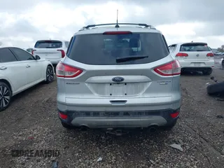 2013 Ford Escape Titanium with VIN 1FMCU9J90DUC22888, listed as a IAAI auction lot 41664550 with 185,568 mi miles and . Bid and sale history available at DreamBid. Image 16.