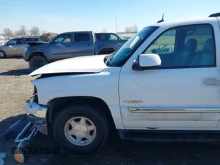 2003 GMC Yukon SLT with VIN 1GKEC13Z13J197955, listed as a IAAI auction lot 41586841 with 208,752 mi miles. Bid and sale history available at carsss.com. Image 21.