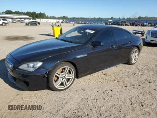 2014 BMW 6 Series 650i xDrive with VIN WBA6B4C55ED099057, listed as a Copart auction lot 71337764 with 30,246 mi miles and Salvage Title. Bid and sale history available at carsss.com. Image 1.