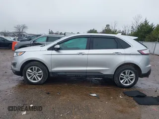 2018 Ford Edge SEL with VIN 2FMPK4J83JBB47090, listed as a IAAI auction lot 41531957 with 107,728 mi miles. Bid and sale history available at carsss.com. Image 14.