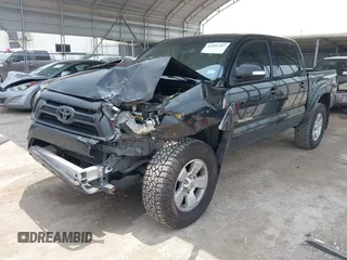 2013 Toyota Tacoma PreRunner with VIN 5TFJU4GNXDX034431, listed as a IAAI auction lot 42201207 with 195,679 mi miles and . Bid and sale history available at DreamBid. Image 2.