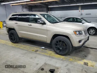 2014 Jeep Grand Cherokee Limited z VIN 1C4RJFBG1EC148908, wystawiony jako Copart lot #54311675 z przebiegiem 90 886 mil mil oraz Szkoda całkowita • Salvage title. Historia ofert i sprzedaży dostępna na DreamBid. Obrazek 4.