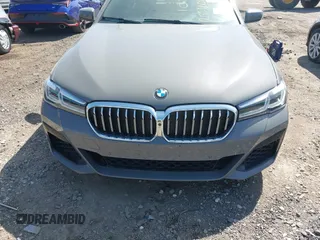 2021 BMW 5 Series 540i xDrive with VIN WBA73BJ03MWX30307, listed as a IAAI auction lot 41891615 with 27,374 mi miles and . Bid and sale history available at DreamBid. Image 12.