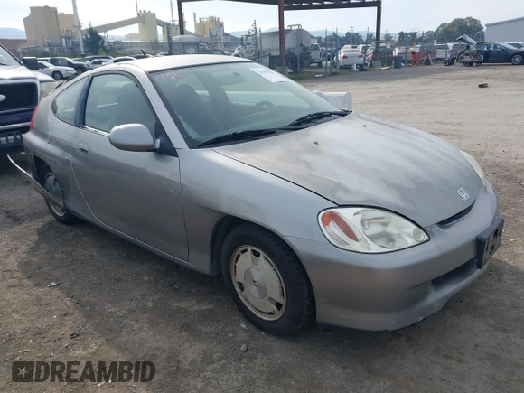 2001 Honda Insight z VIN JHMZE14741T003228, wystawiony jako IAAI lot #41432511 z przebiegiem 227 809 mil mil oraz . Historia ofert i sprzedaży dostępna na DreamBid. Obrazek 1.