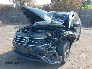 2022 Volkswagen Tiguan SE with VIN 3VV2B7AXXNM060140, listed as a IAAI auction lot 40300638 with 25,955 mi miles and . Bid and sale history available at DreamBid. Image 6.