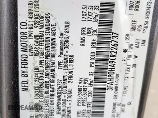 2012 Ford Fusion SE z VIN 3FAHP0HA9CR226737, wystawiony jako Copart lot #57229835 z przebiegiem 204 811 mil mil oraz Szkoda całkowita • Salvage title. Historia ofert i sprzedaży dostępna na DreamBid. Obrazek 12.