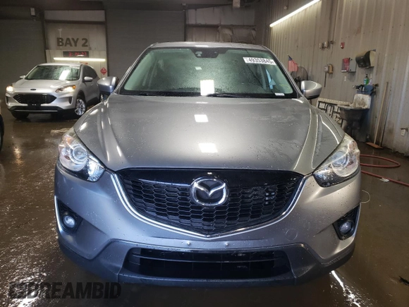 2015 Mazda CX-5 Grand Touring with VIN JM3KE4DY5F0456142, listed as a Copart auction lot 49353845 with 193,512 mi miles and Salvage Title. Bid and sale history available at carsss.com. Image 5.
